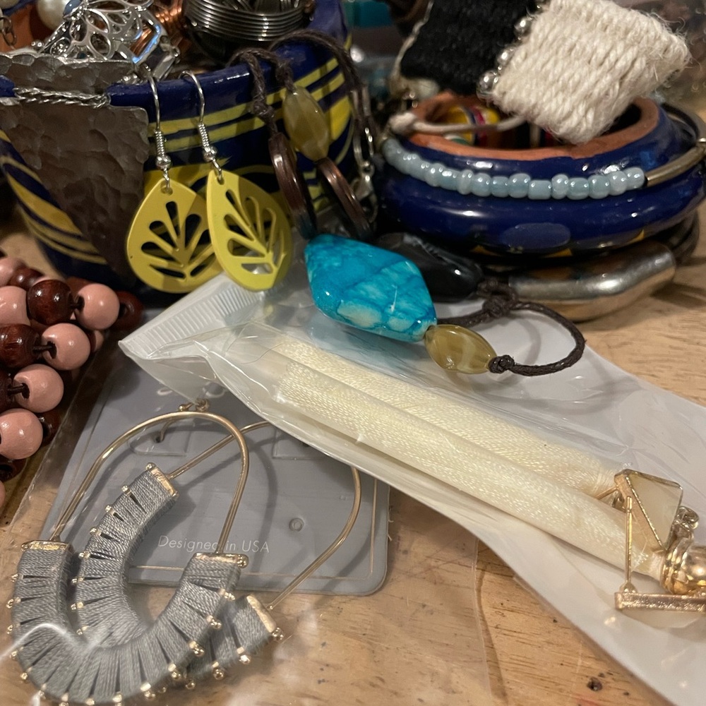 Blue and yellow trinket dish with fun jewelry